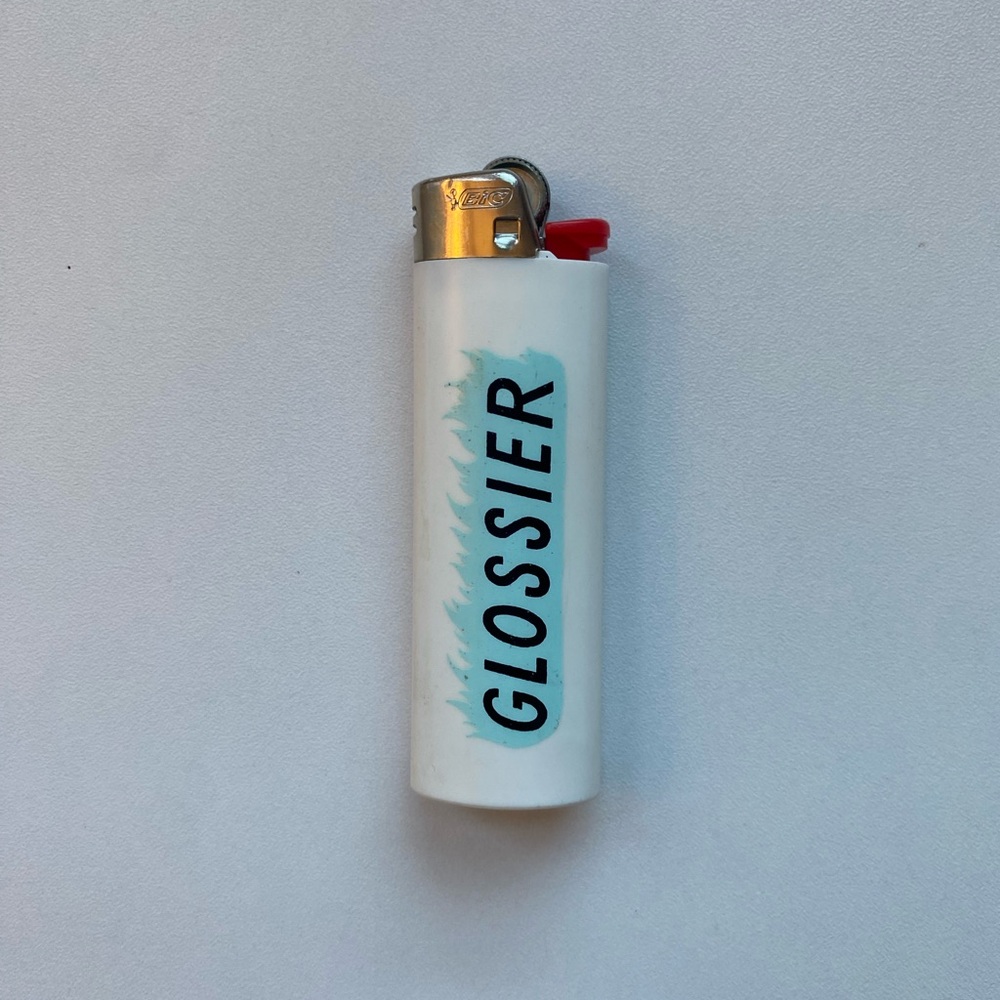 Glossier White Lighter with Blue Logo